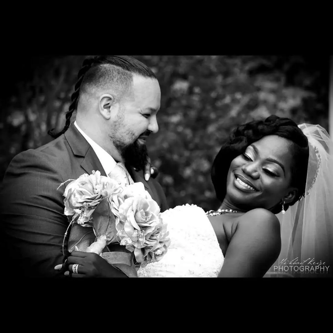 Portrait of Marcelle and Miguel following their white wedding ceremony