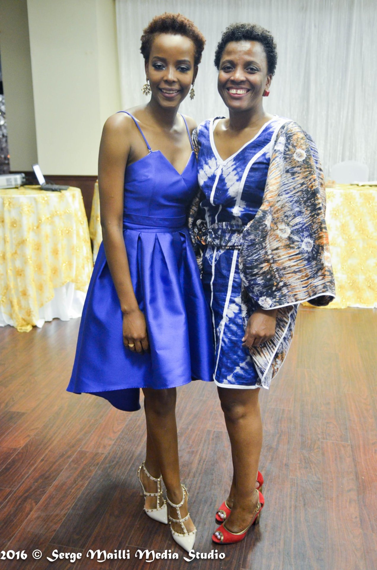 The graduate and event planner Josiane Djachechi celebrating together