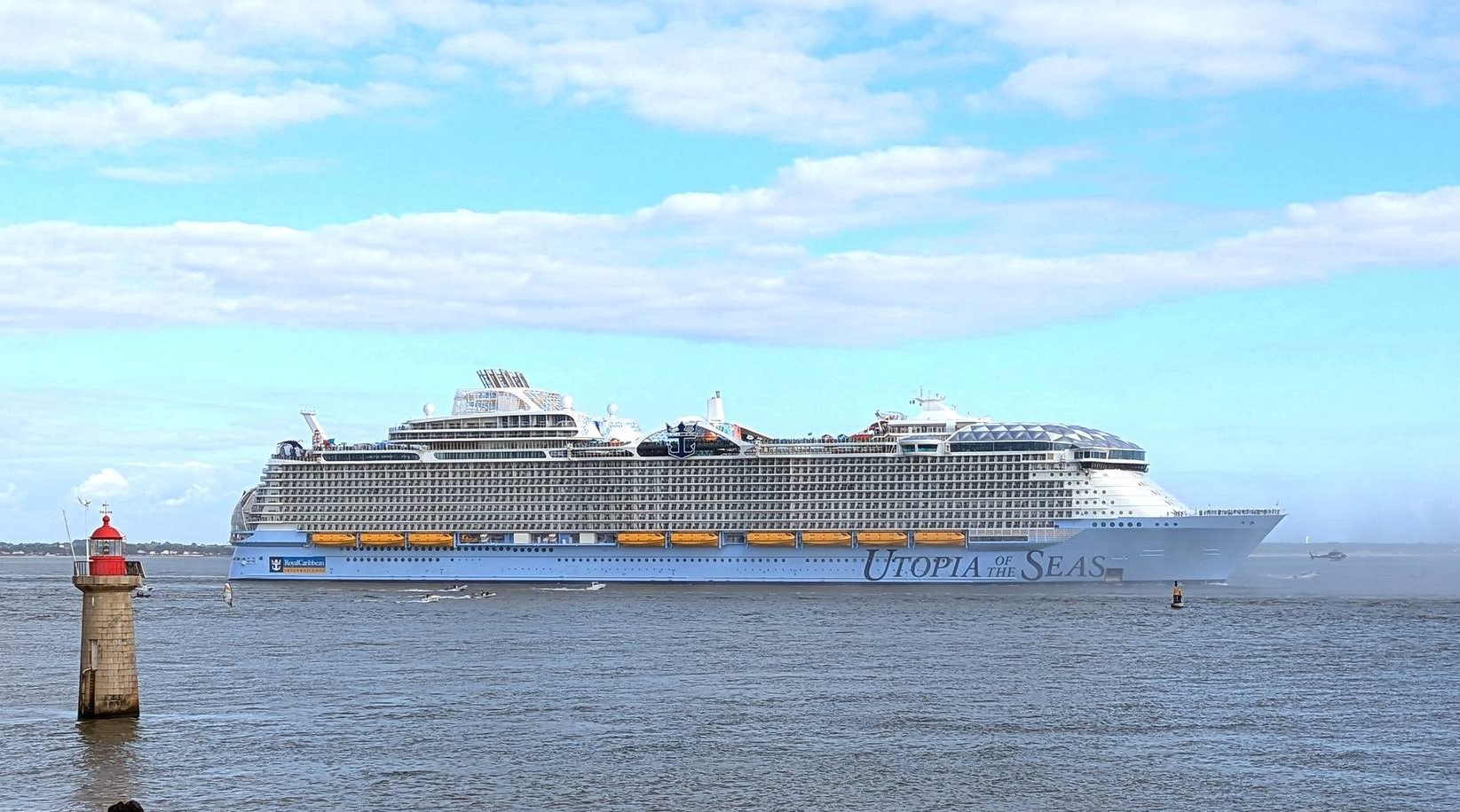 Exterior view of Royal Caribbean's Utopia of the Seas, the setting selected for a milestone cruise celebration.